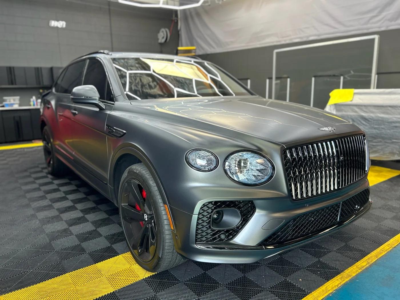 Satin grey Bentley Bentayga in the Artec Automotive detailing bay