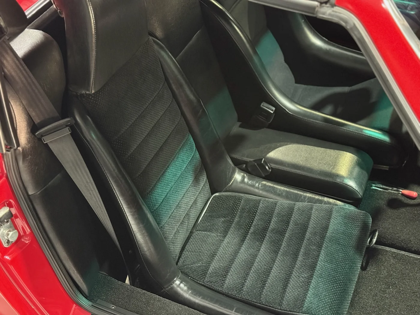 Cloth sports seats of a classic BMW M car after a deep interior clean