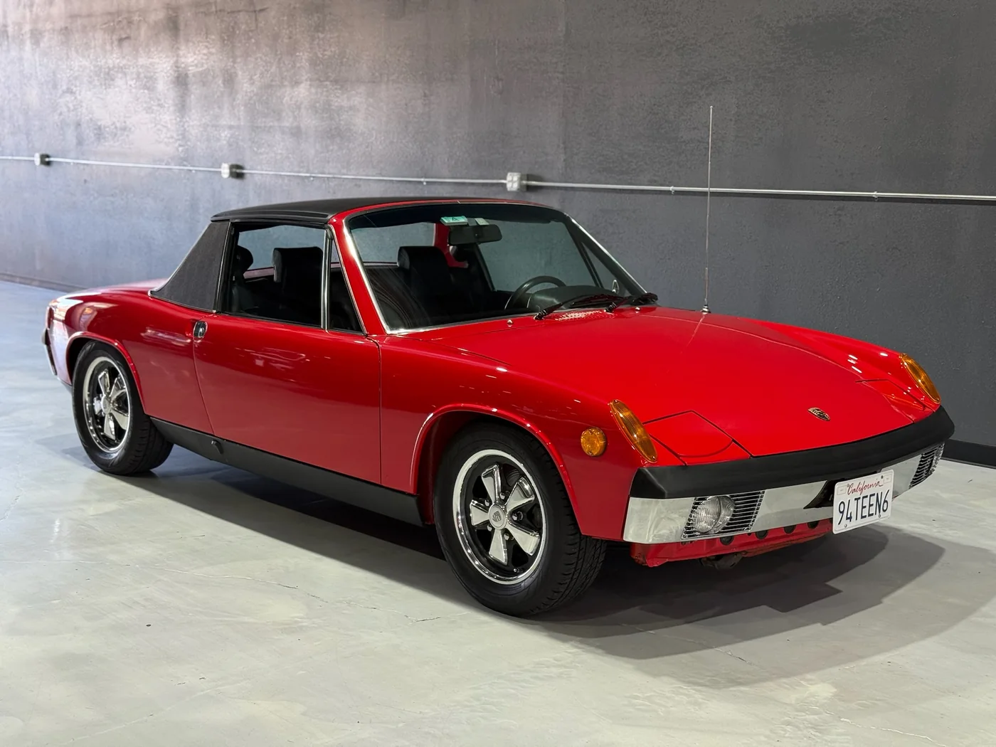 Red Porsche 914 targa restored and photographed in the Artec Automotive workshop