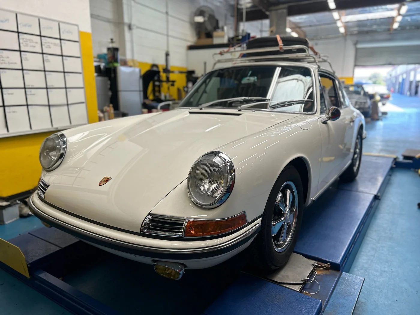 Cream classic Porsche 911 in the Artec Automotive workshop in Belmont, CA