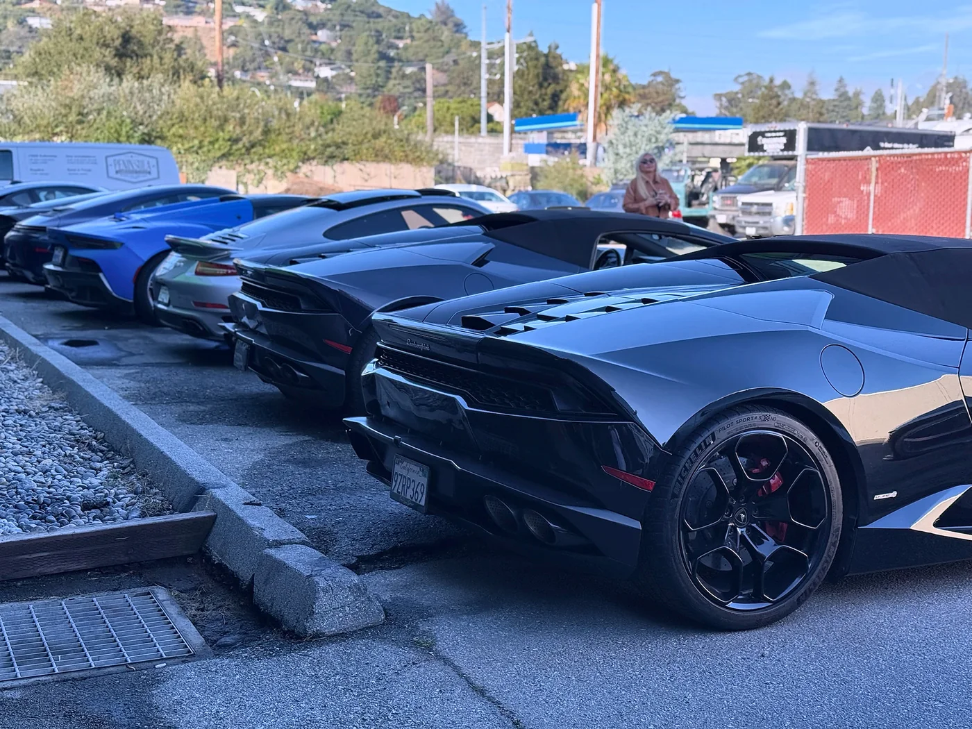 Black Lamborghini parked outside the Artec Automotive shop