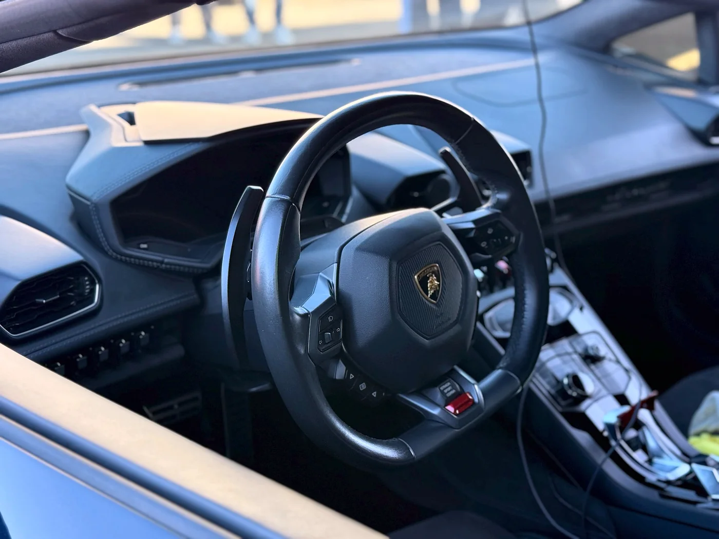 Lamborghini steering wheel and carbon dashboard detail