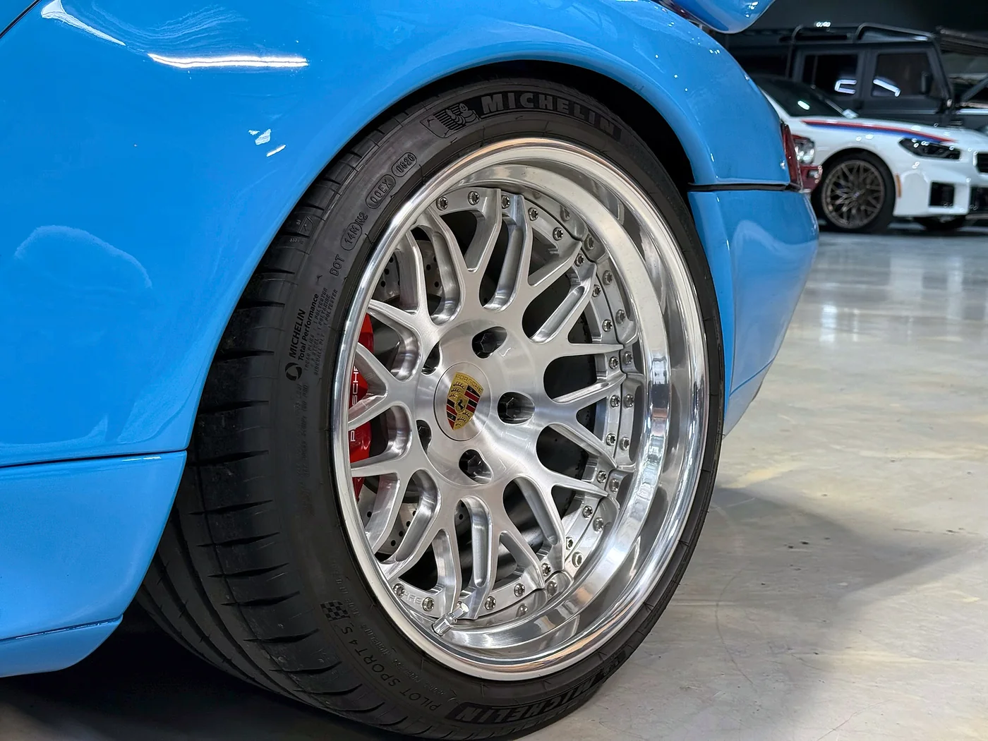 Michelin tyre and silver split-rim wheel detail on a Porsche 993