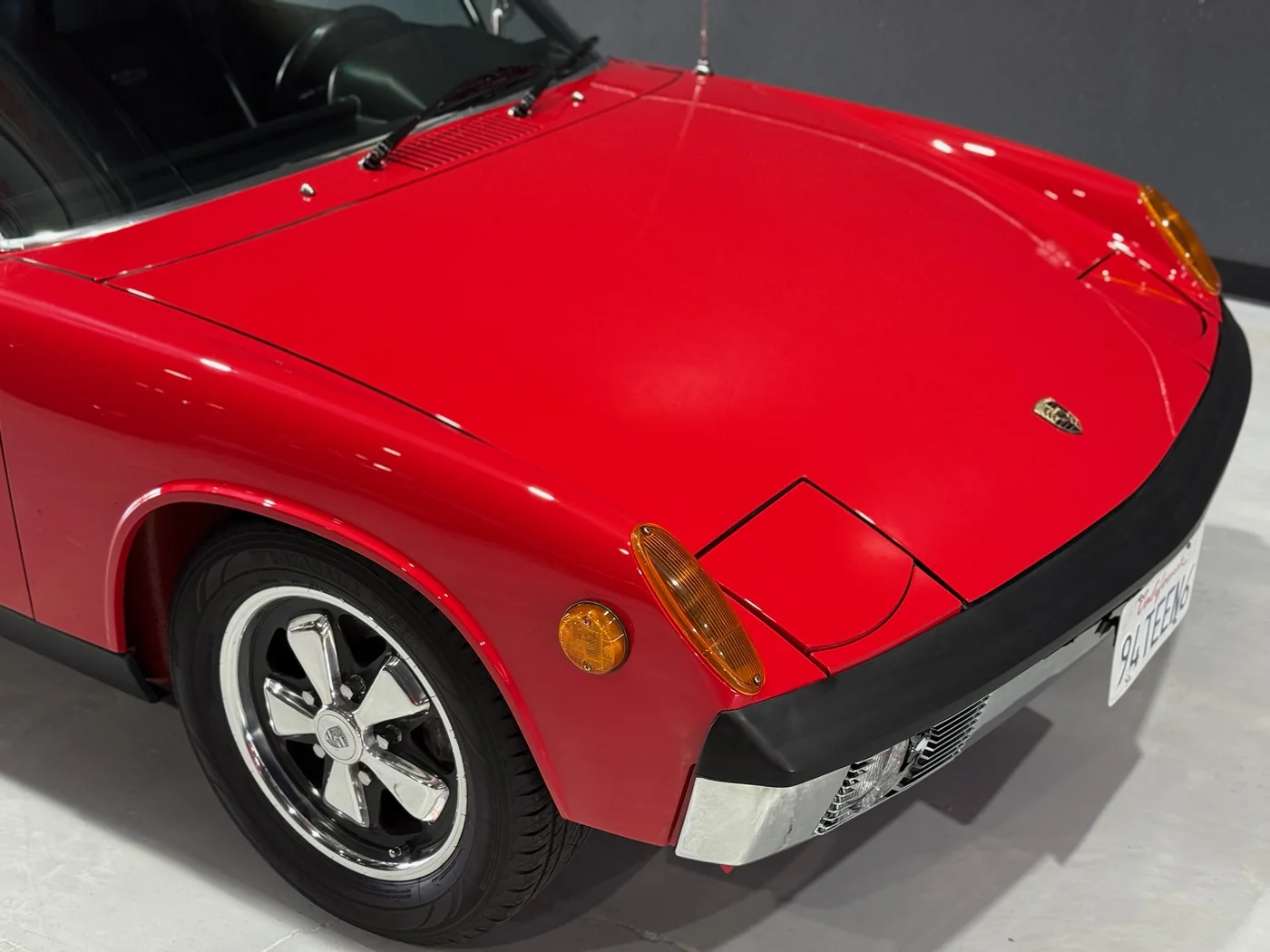 Front end of a red Porsche 914 classic sports car